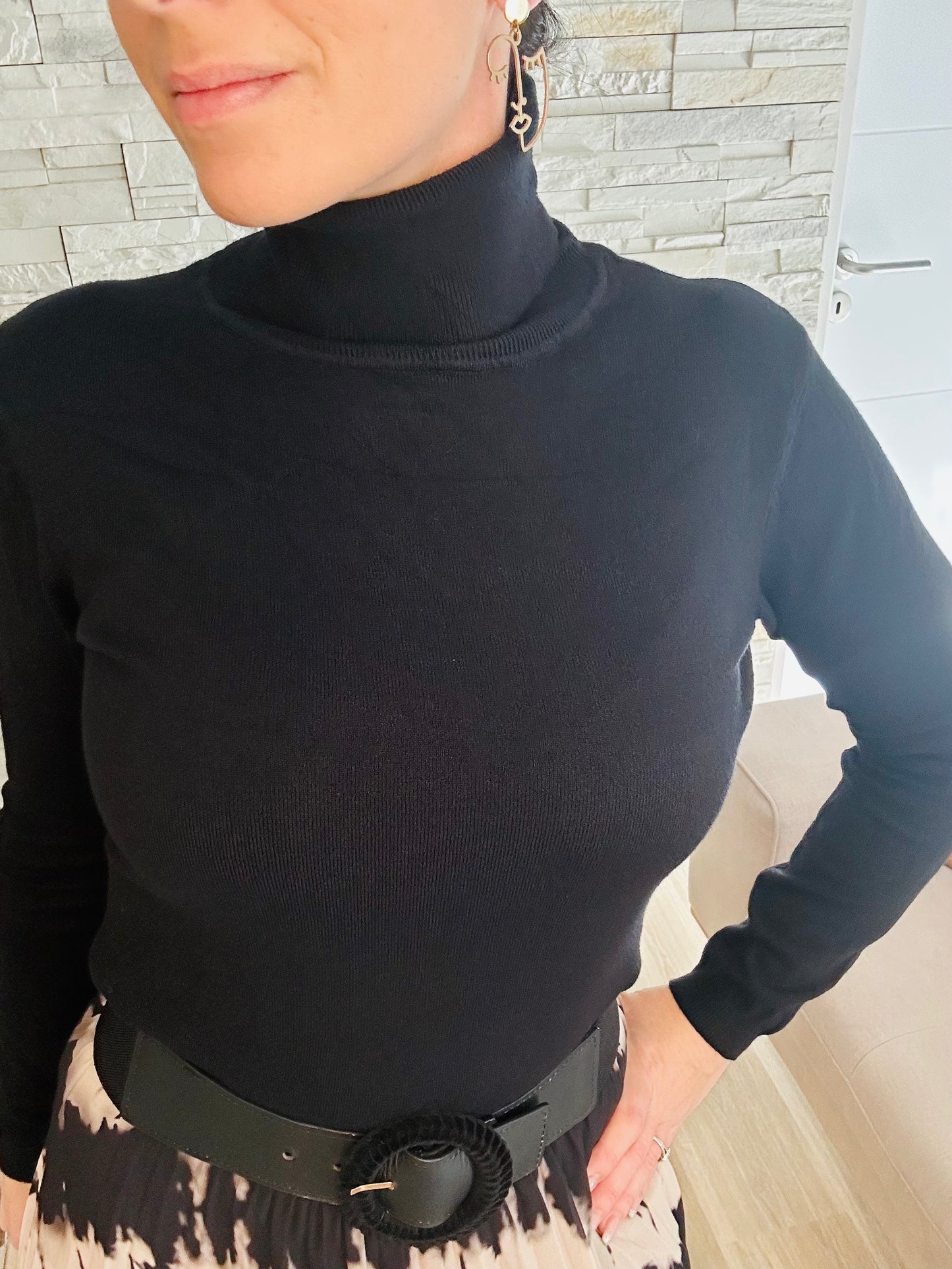 Pull col roulé